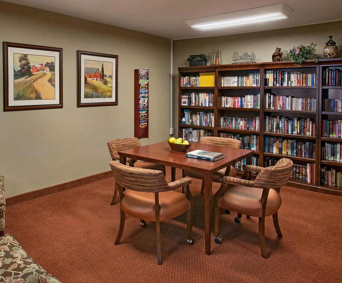 American House Carpenter independent and assisted senior living facility library and activity room adsf